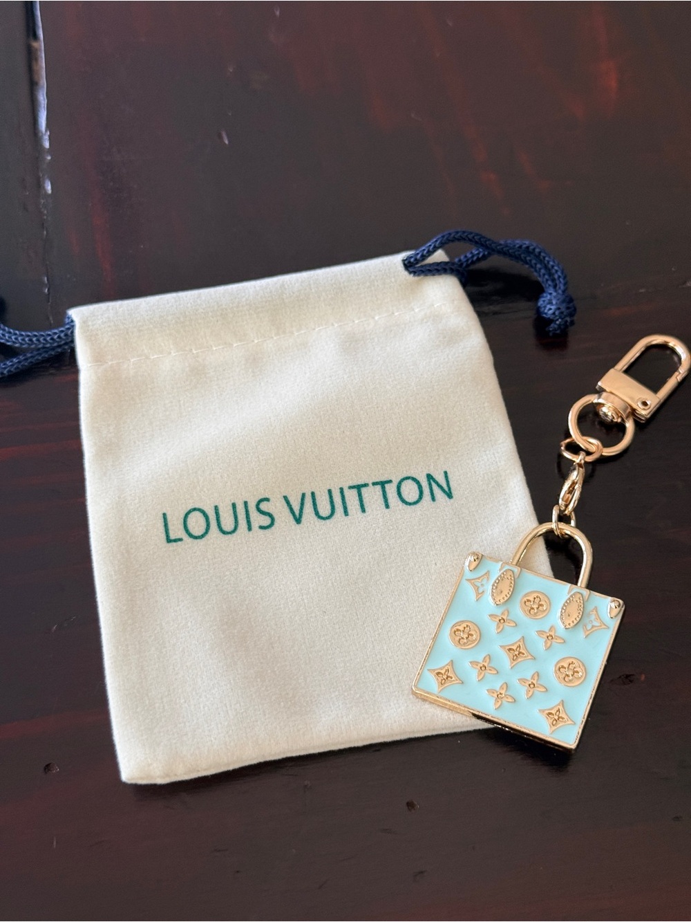 Louis Vuitton EUC stamped Mini
Bag Charm/Keychain/ Tiffany 
Blue & Gold 3” long